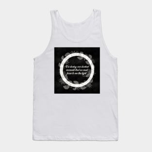 It is during our darkest moments that we must focus to see the light. Tank Top